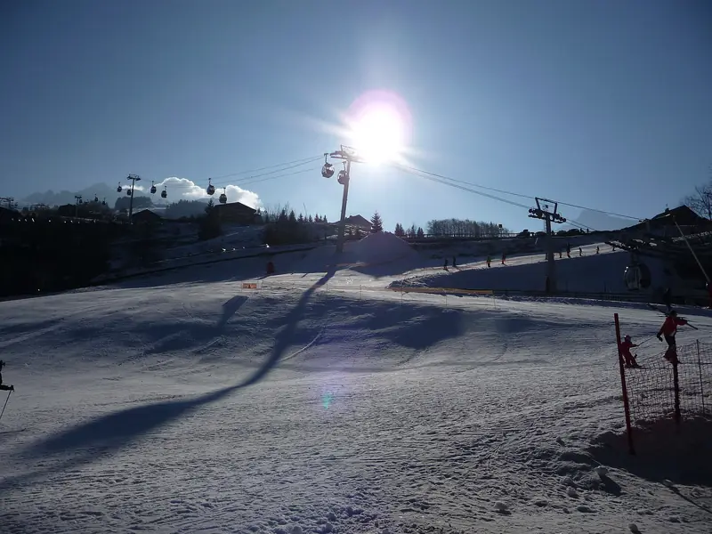 A panorama of the snowy La Clusaz pistes from the Chemin des Riffroids