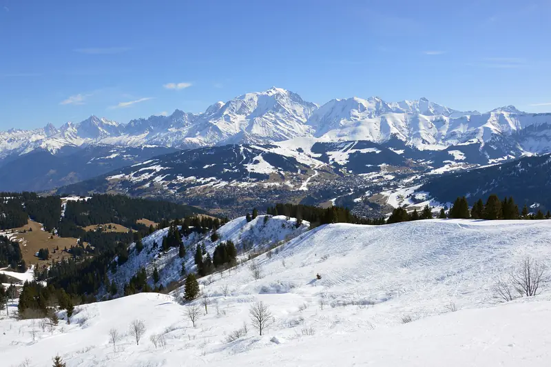 The snow-covered country around Megève with a view of the Mont Blanc massif from Le Christomet, white slopes in front